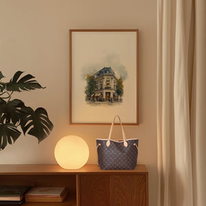 Framed print of a parisian Haussmann building on a corner block. Purchase for a chance to win a Louis Vuitton Neverfull.