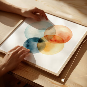 Framed abstract art with colorful circles. Purchase for a chance to win a gold Van Cleef & Arpels Sweet Alhambra necklace.