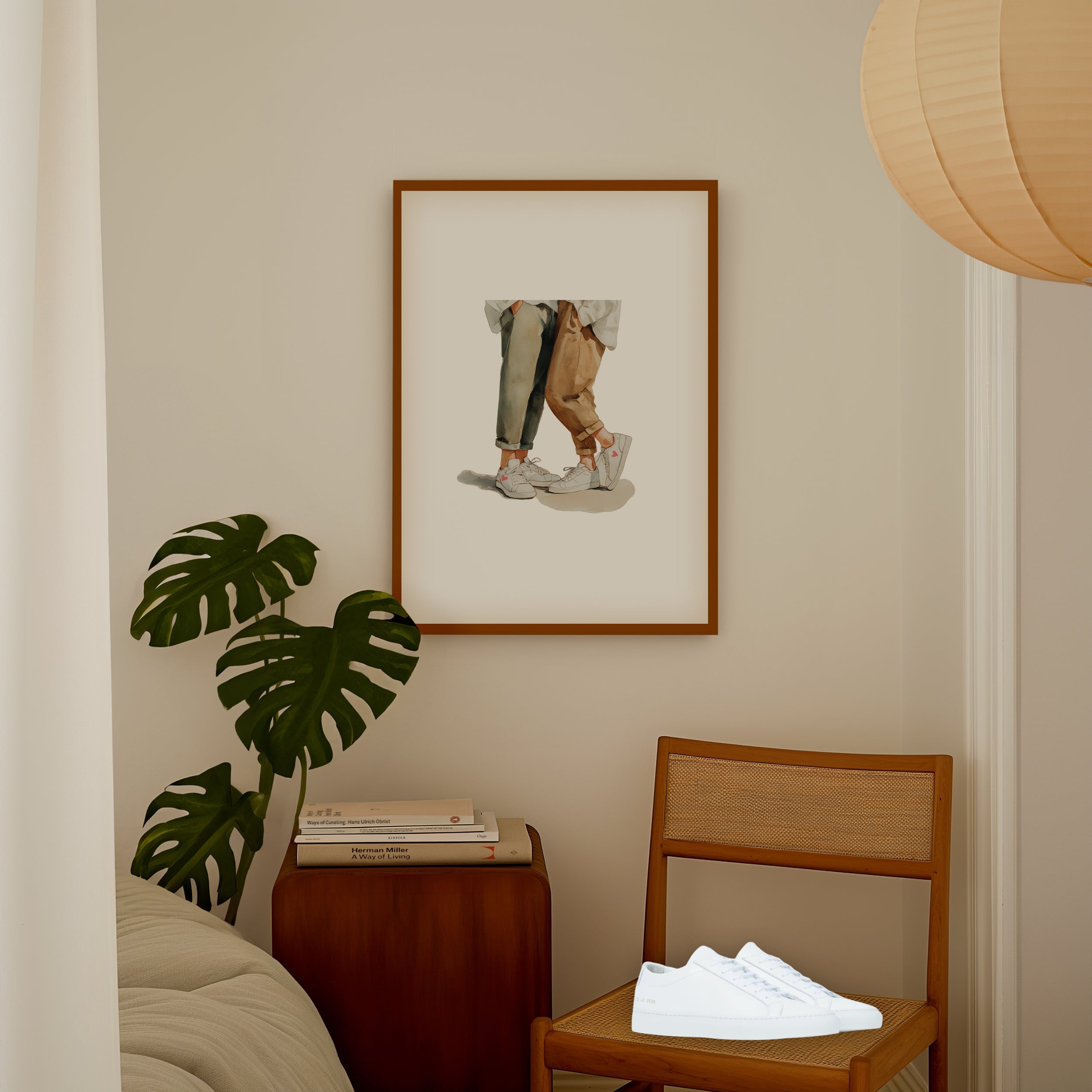 Framed print of two people wearing white sneakers. Purchase for a chance to win white Common Projects Original Achilles Low sneakers.