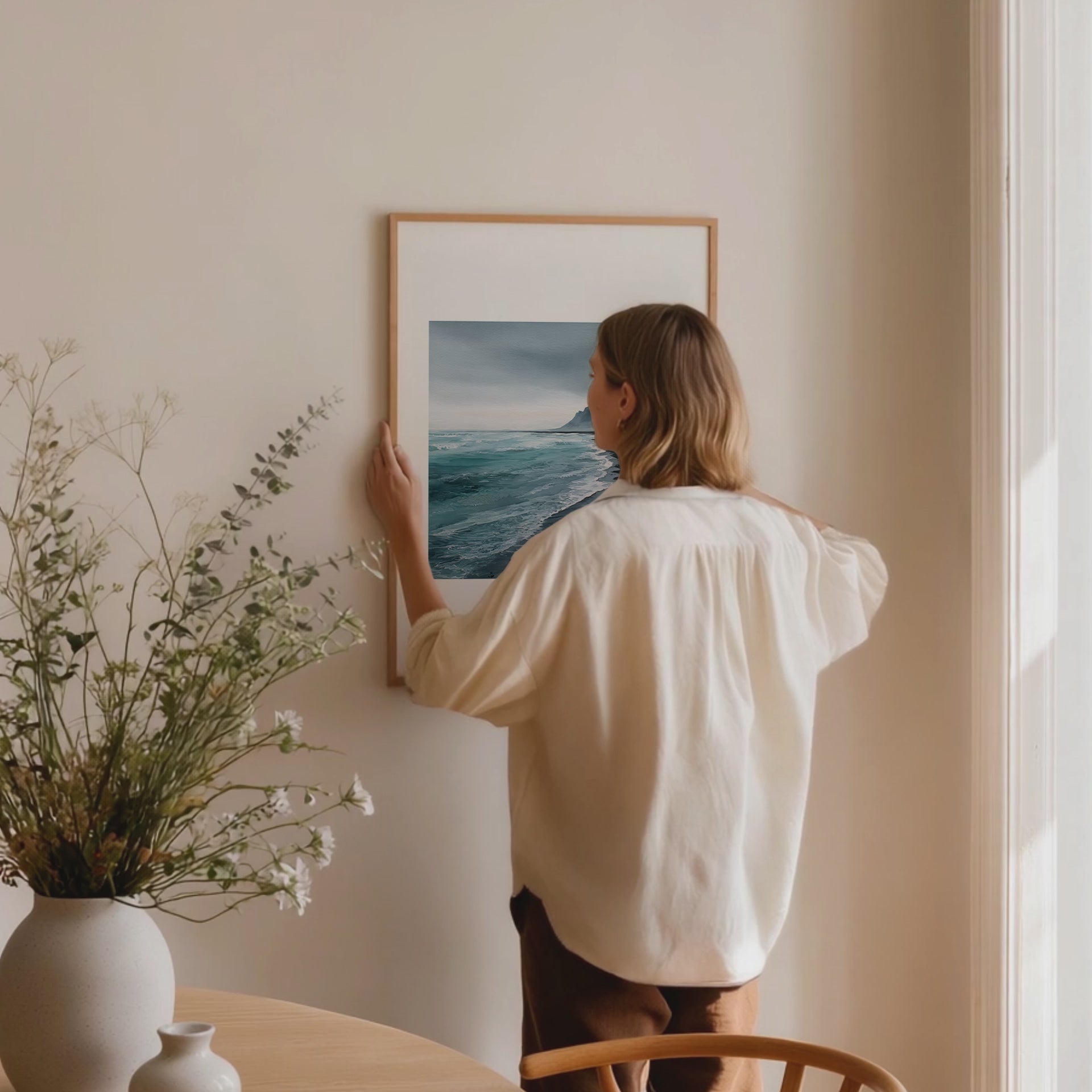 Framed minimalist artwork of a moody black bay. Purchase print for a chance to win a Tudor Black Bay 54.